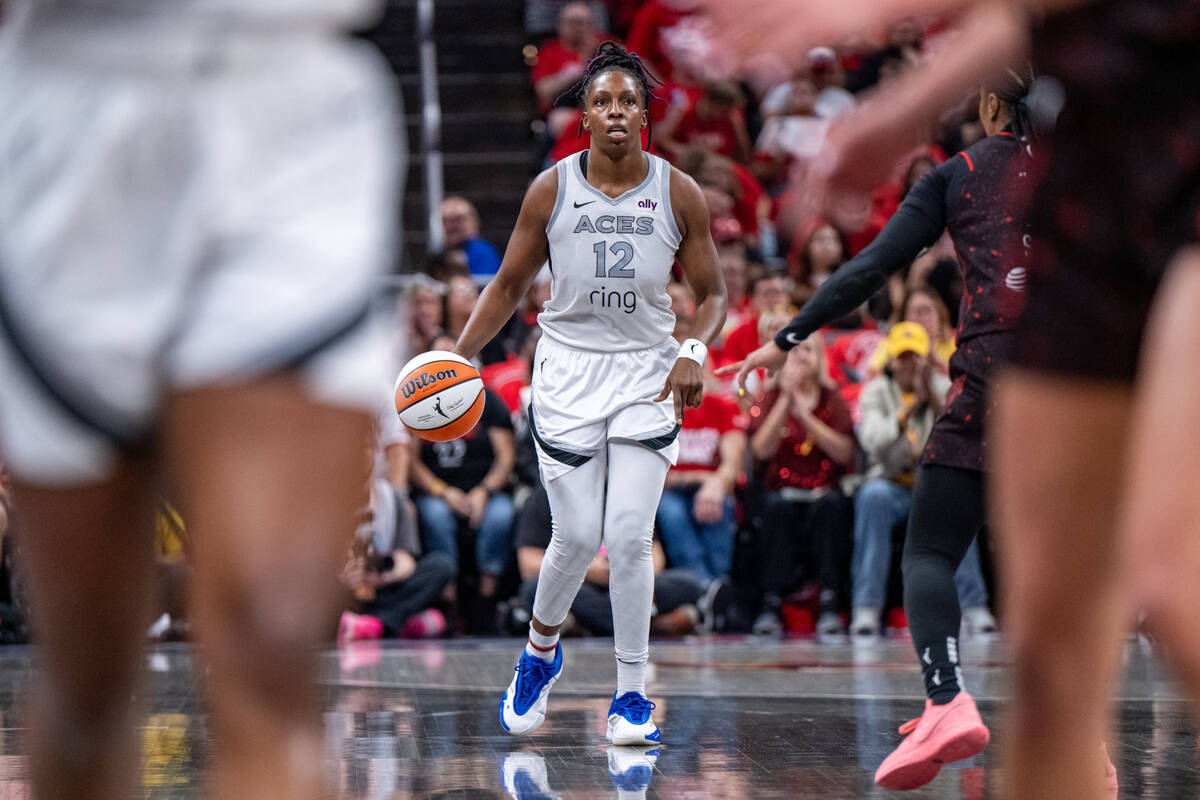 Las Vegas Aces guard Chelsea Gray (12) brings the ball upcourt during the first half of Game 4 ...