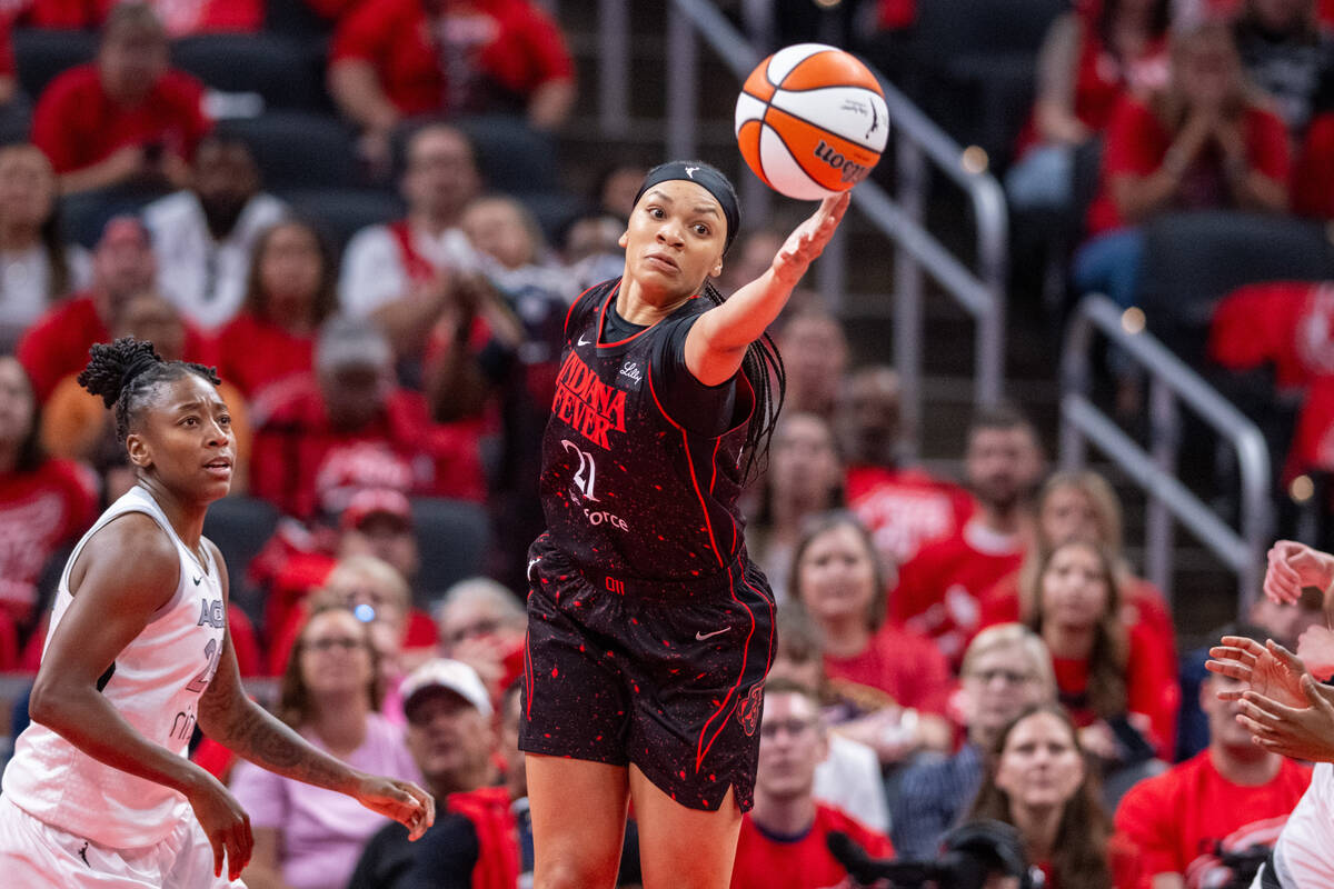 Indiana Fever forward Makayla Timpson (21) reaches for a rebound during the second half of Game ...