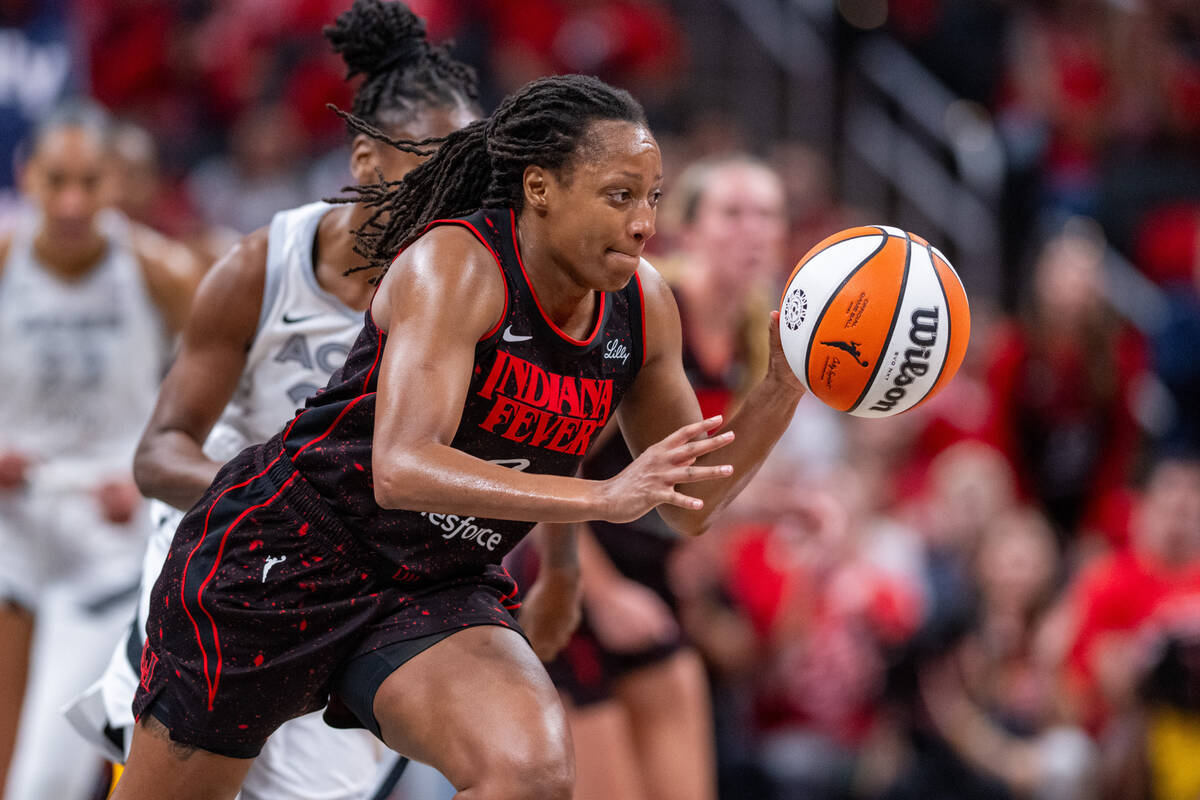 Indiana Fever guard Kelsey Mitchell makes a break upcourt with the ball during the second half ...
