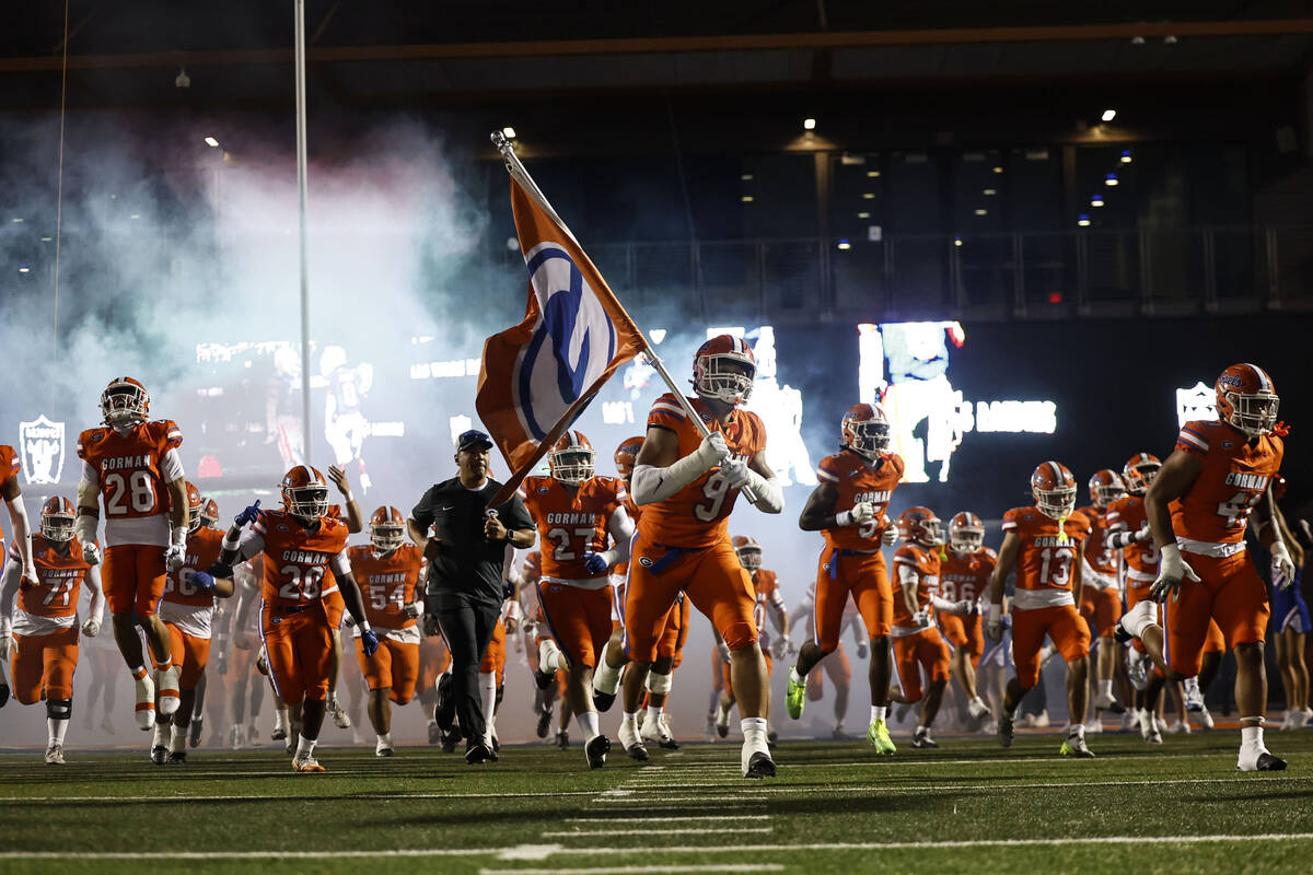 Bishop Gorman takes the field before the start of their top 10 matchup against Mater Dei Friday ...