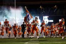 Bishop Gorman takes the field before the start of their top 10 matchup against Mater Dei Friday ...
