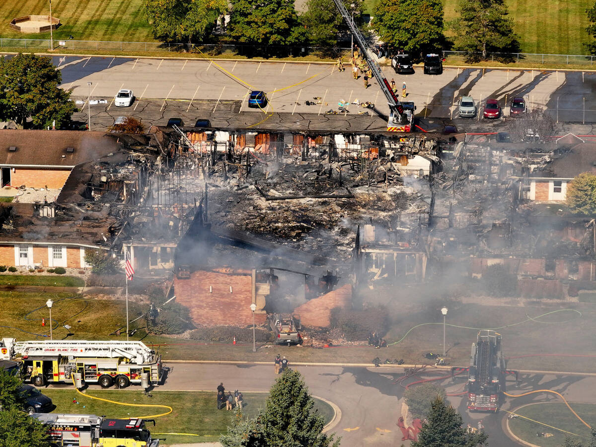 Emergency crews respond to a shooting and fire at The Church of Jesus Christ of Latter-day Sain ...