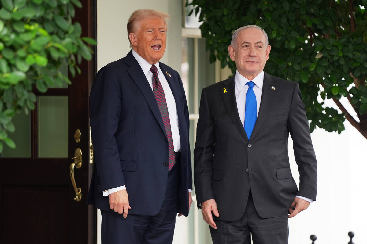 President Donald Trump, left, greets Israeli Prime Minister Benjamin Netanyahu at the White Hou ...