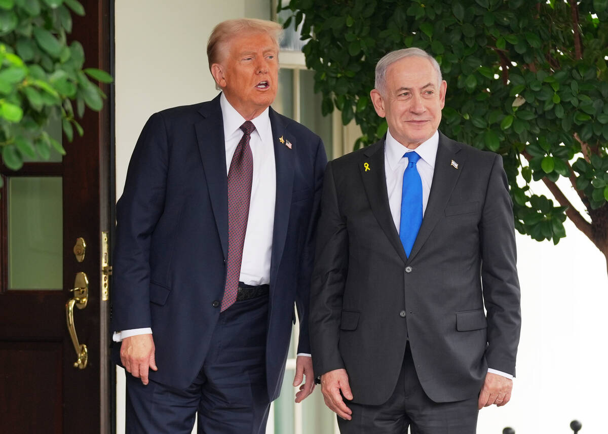 President Donald Trump, left, greets Israeli Prime Minister Benjamin Netanyahu at the White Hou ...