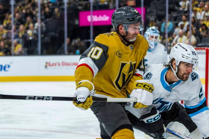 Golden Knights center Colton Sissons (10) looks to the pouch with Utah Mammoth defenseman Dmitr ...