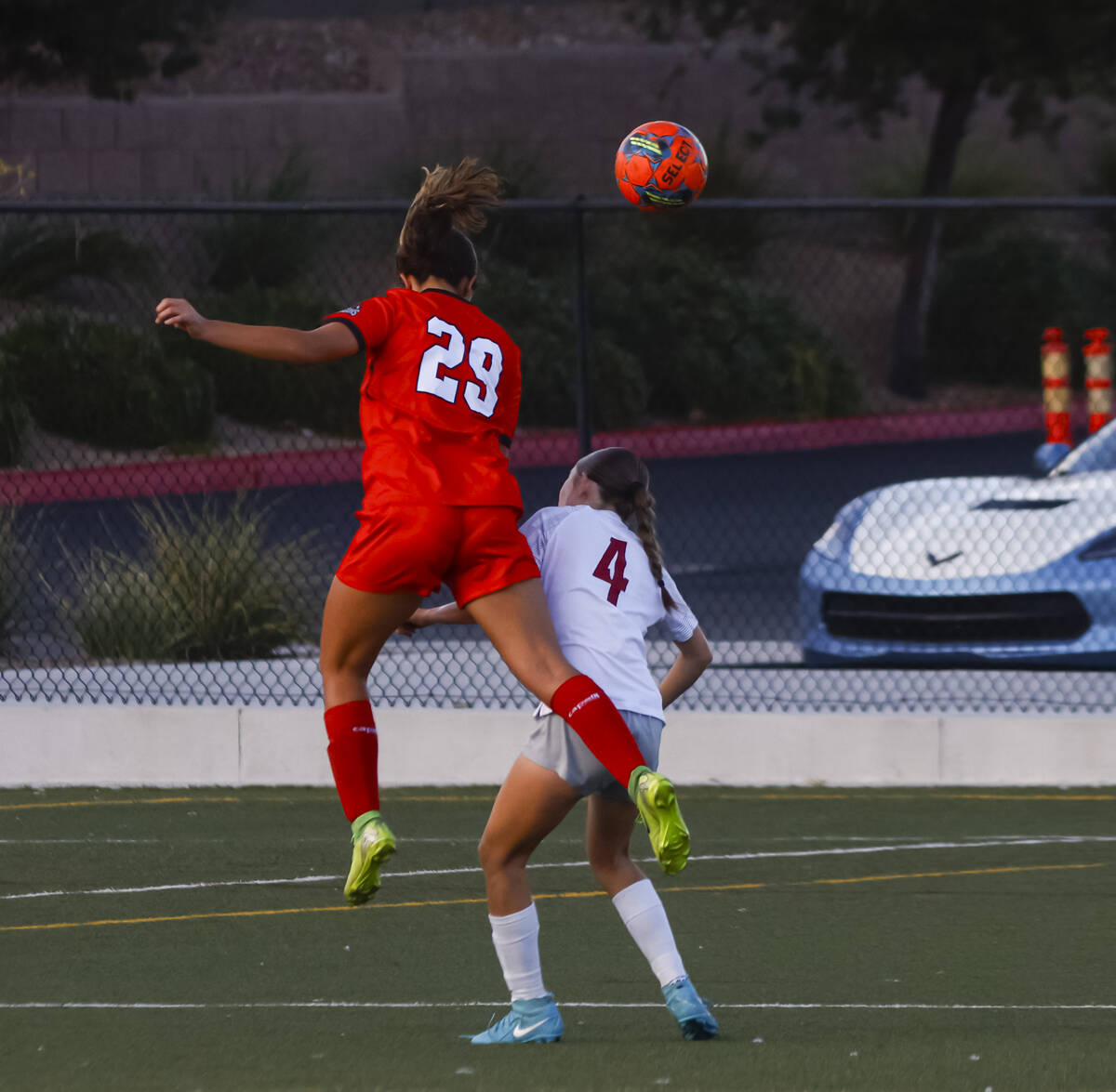 Doral Academy's Sienna Turco (29) heads the ball over Desert Oasis' Ava Lyman (4)duri ...