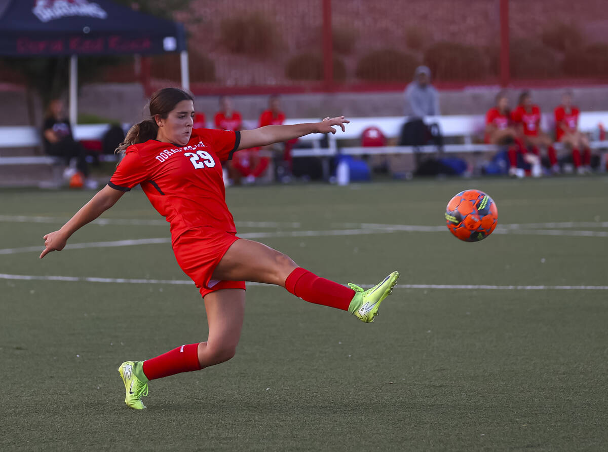 Doral Academy's Sienna Turco (29) kicks the ball during a soccer game against Desert Oasis ...