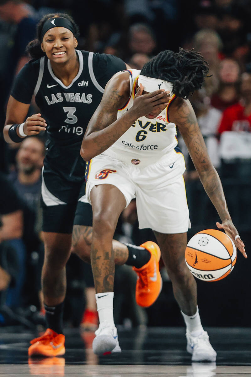 Indiana Fever forward Natasha Howard (6) reacts to an injury to the eye during game five of a W ...
