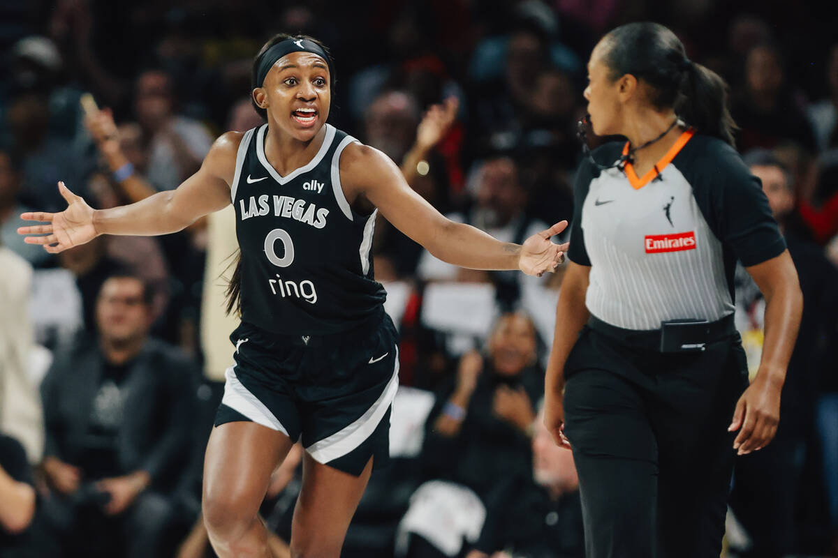 Aces guard Jackie Young (0) reacts to a referee not calling a foul on the Indiana Fever during ...