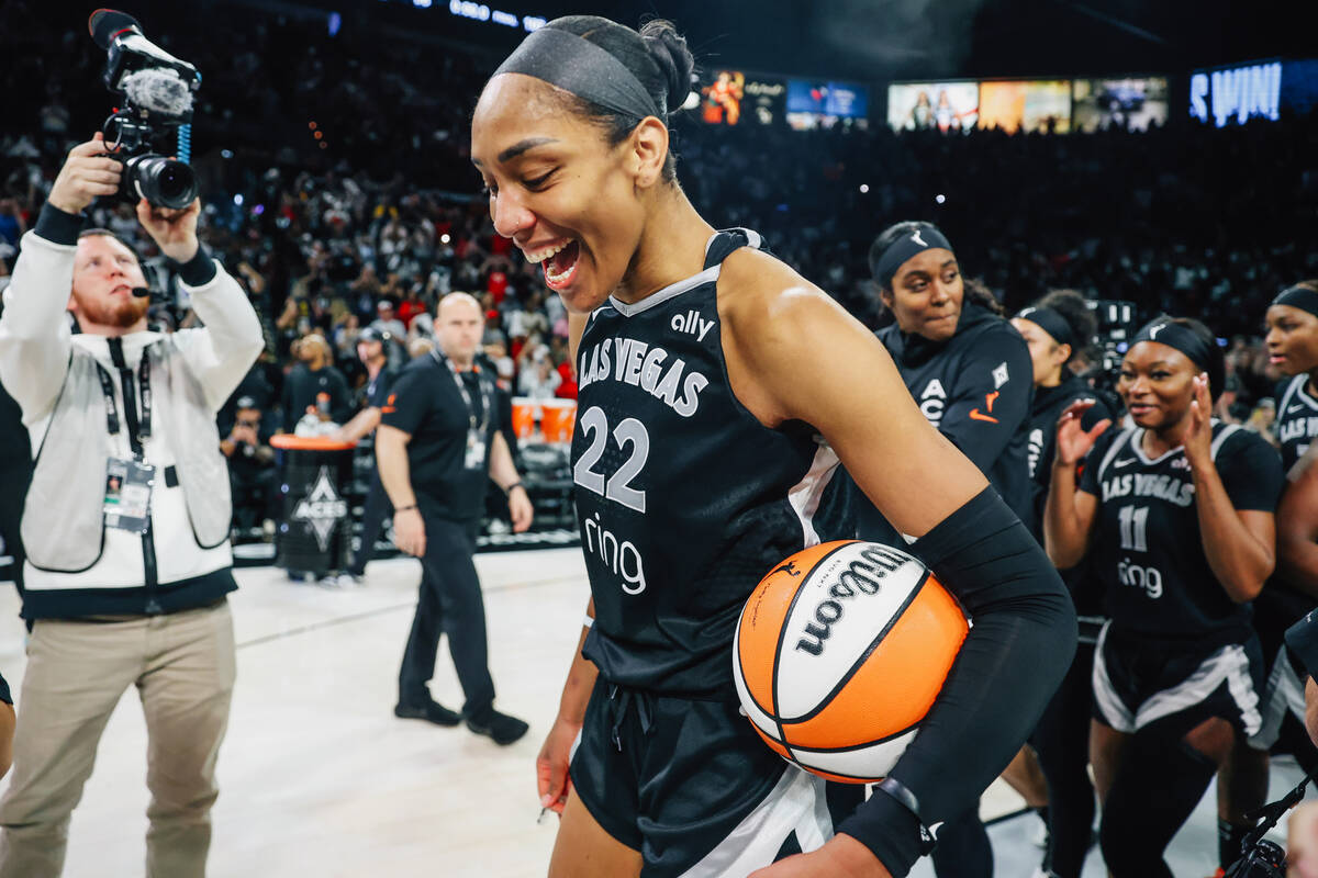 Aces center A'ja Wilson (22) celebrates winning game five of a WNBA semifinals series betw ...