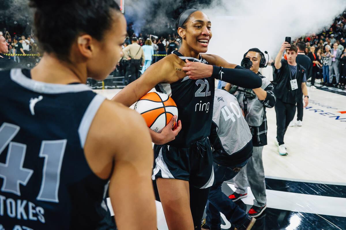 Aces center A'ja Wilson (22) celebrates winning game five of a WNBA semifinals series betw ...