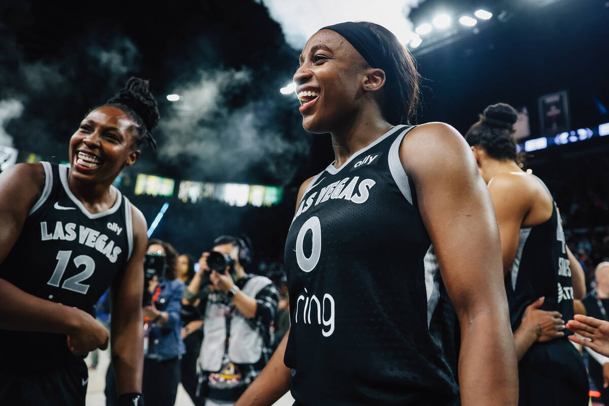 Aces guard Jackie Young (0) celebrates winning game five of a WNBA semifinals series between th ...