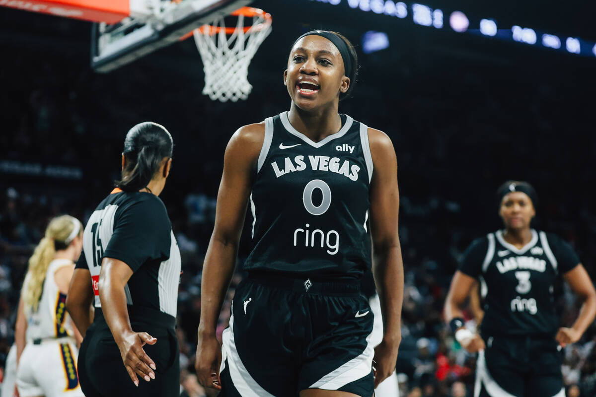 Aces guard Jackie Young (0) celebrates drawing a foul during game five of a WNBA semifinals ser ...