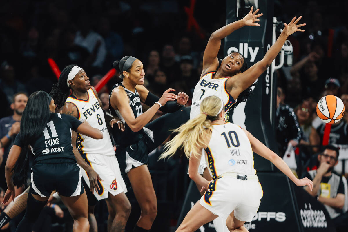Indiana Fever forward Aliyah Boston (7) reaches for a loose ball during game five of a WNBA sem ...