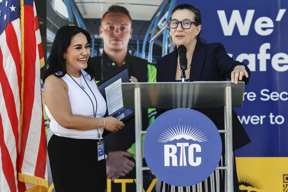 From right: Sen. Rochelle Nguyen, D-Las Vegas, presents an award to RTC government affairs anal ...