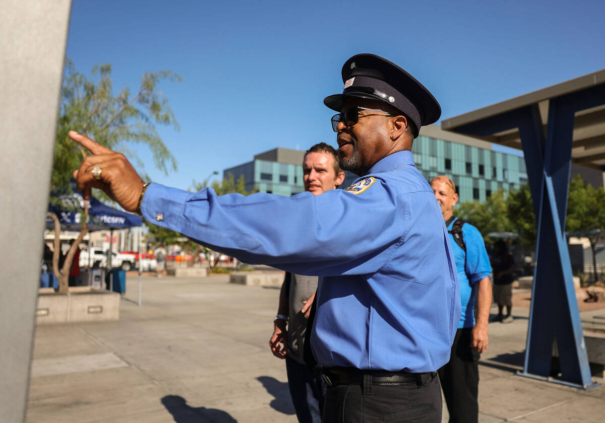 RTC operator Drew Bogart assists riders locate the bus they need during a media event hosted by ...