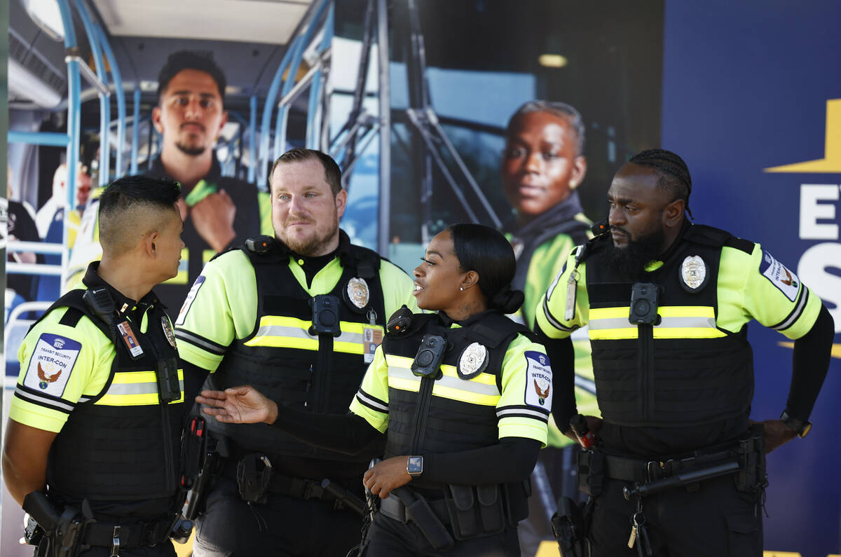 RTC transit security officers talk before the start of a media event hosted by the Regional Tra ...