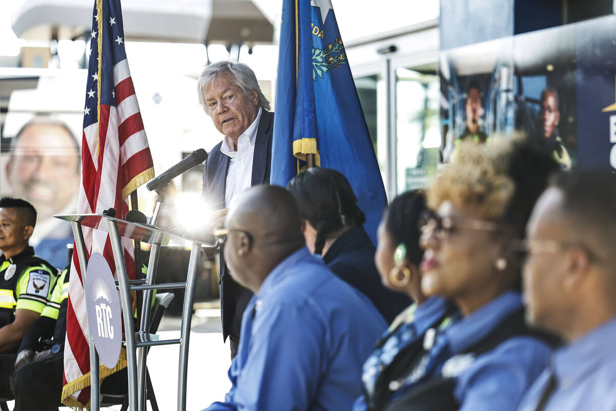Clark County Commissioner Tick Segerblom, top/left, acknowledges RTC operators during a media e ...