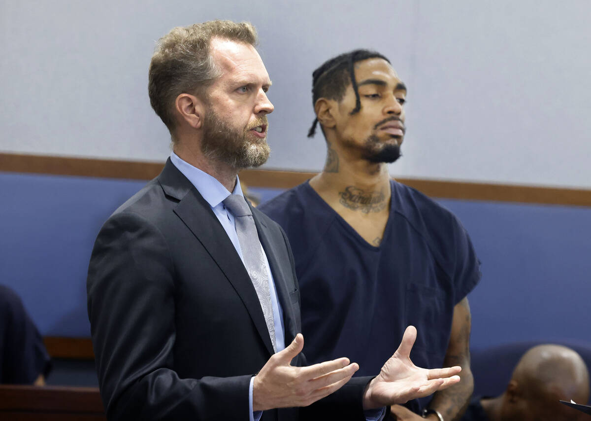 Isaiah Pierce, right, accused of fatally stabbing a UNLV student, listens as his attorney Rober ...