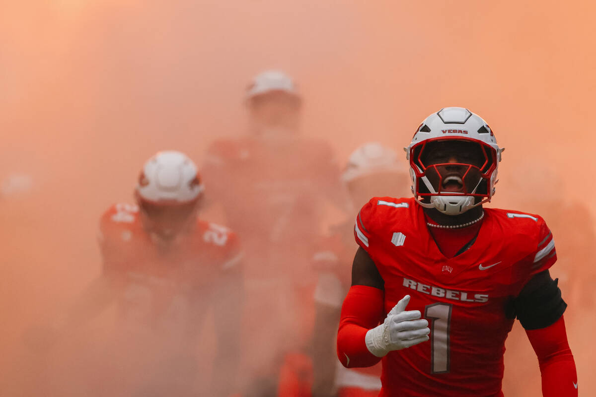 UNLV runs out before the football game on Saturday, Sept. 6, 2025 at Allegiant Stadium in Las V ...