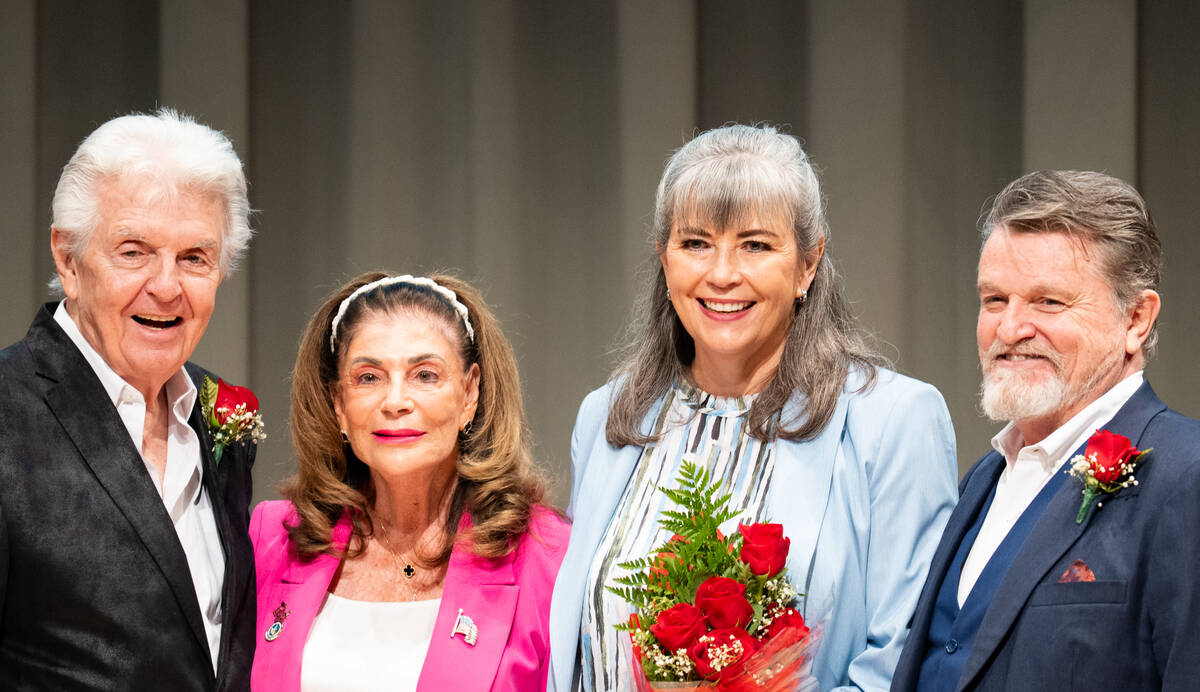 Newly appointed councilwoman Kara Kelley is sworn in during a special Las Vegas City Council me ...
