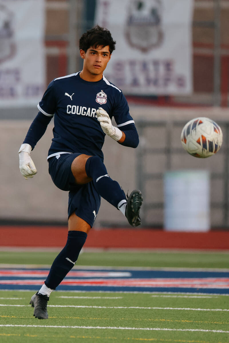Coronado goalkeeper Logan Pierce (0) passes to a teammate during the soccer game on Tuesday, Se ...