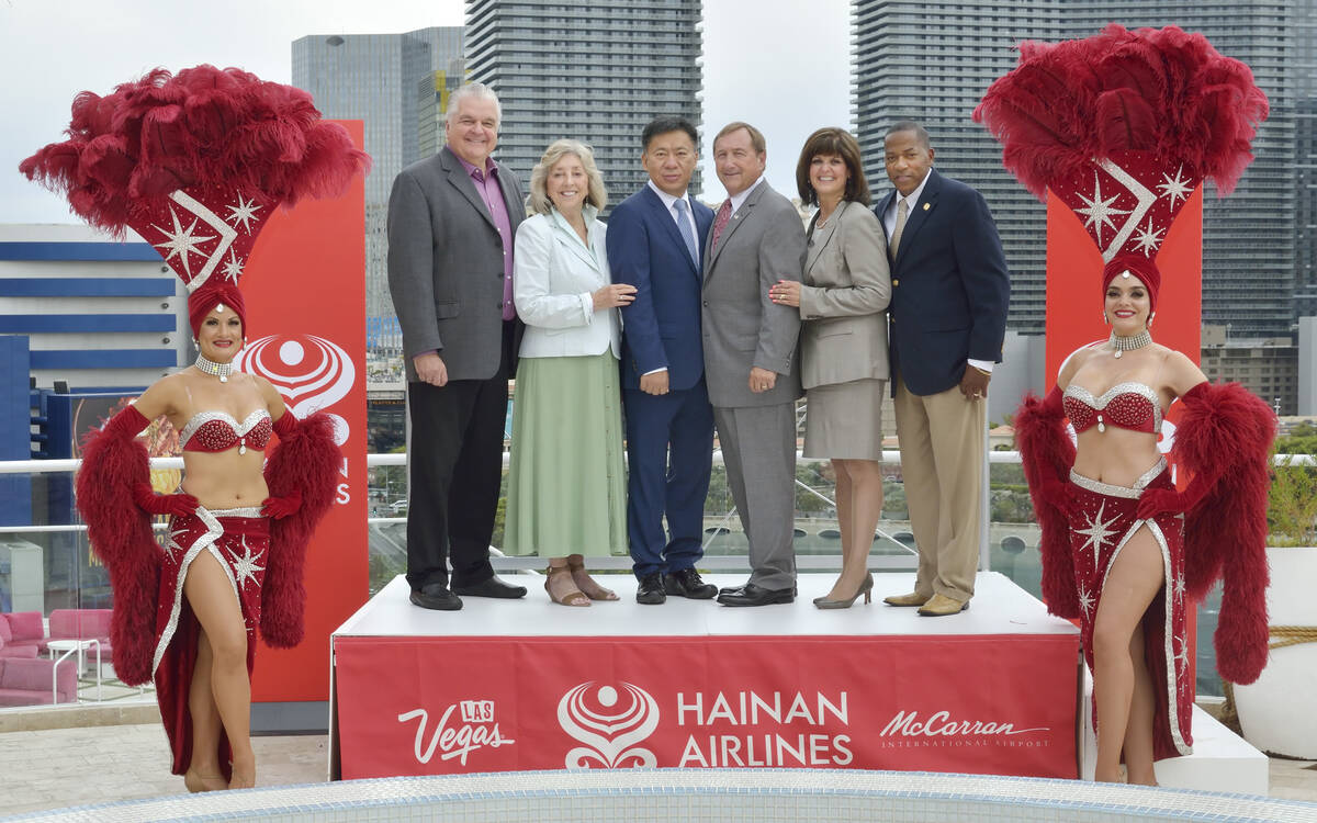 Shown at a press conference at the Cromwell announcing non-stop flights from China to Las Vegas ...