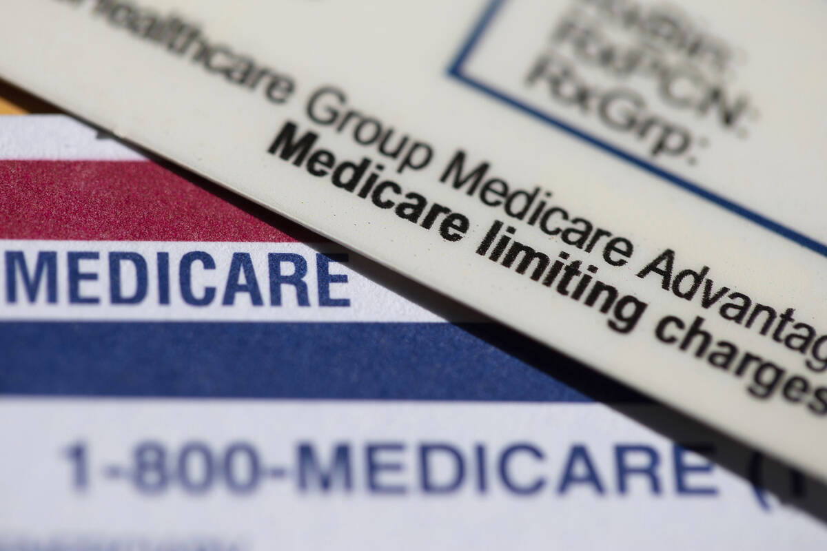 FILE - A Medicare Advantage PPO card rests on top of a Medicare card in Portland, Ore., June 10 ...