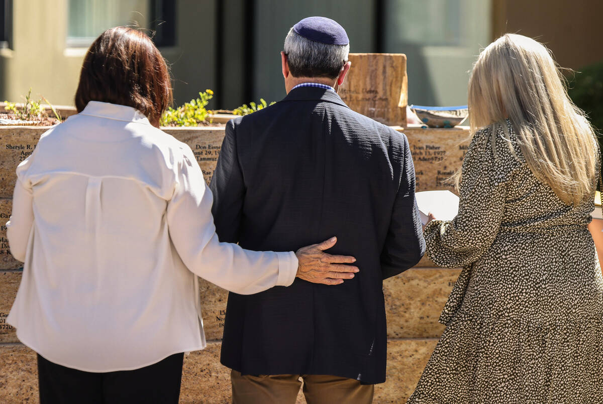 Congregants mourn the loss of loved ones during a Yahrzeit Engraving Dedication in the King Dav ...