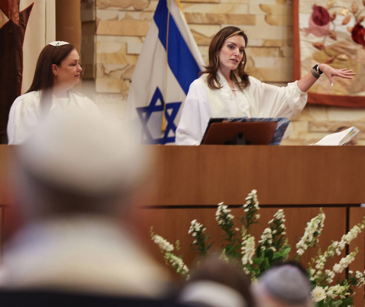 Rabbi-Cantor Jessica Hutchings gives the Yom Kippur sermon at Congregation Ner Tamid Thursday, ...