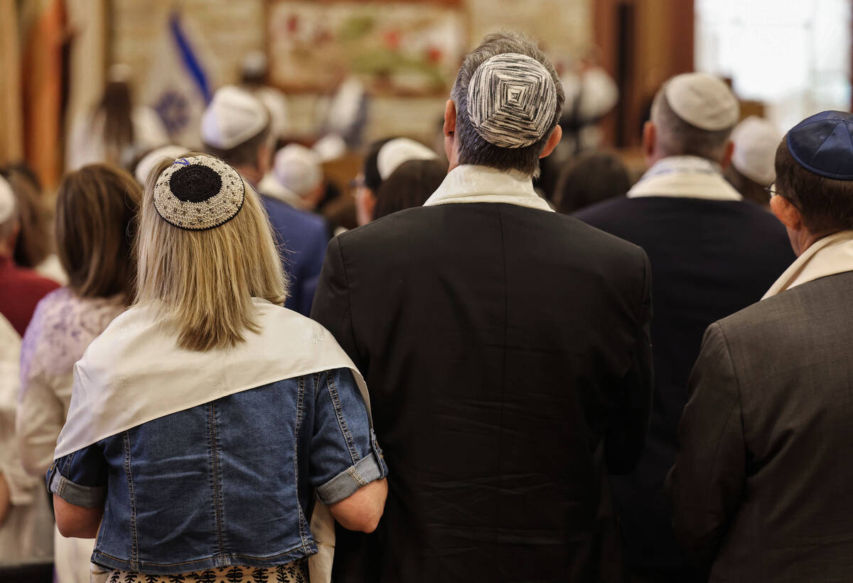 Rabbi-Cantor Jessica Hutchings gives the Yom Kippur sermon at Congregation Ner Tamid Thursday, ...