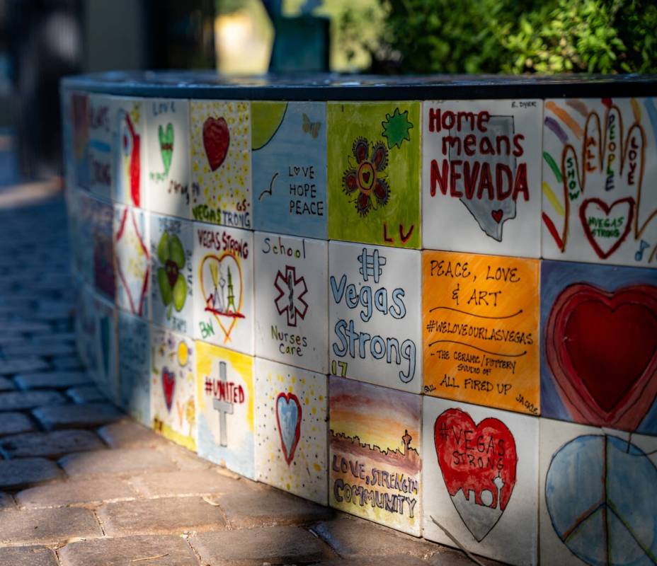 Tiles made by community members are displayed at the Las Vegas Community Healing Garden, a comm ...