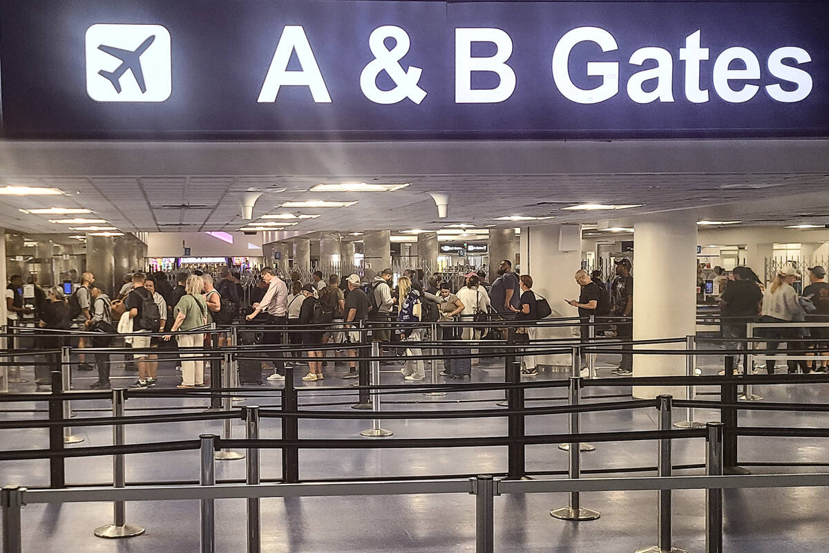 The security line for A and B Gates at Harry Reid International Airport is seen Wednesday, Octo ...