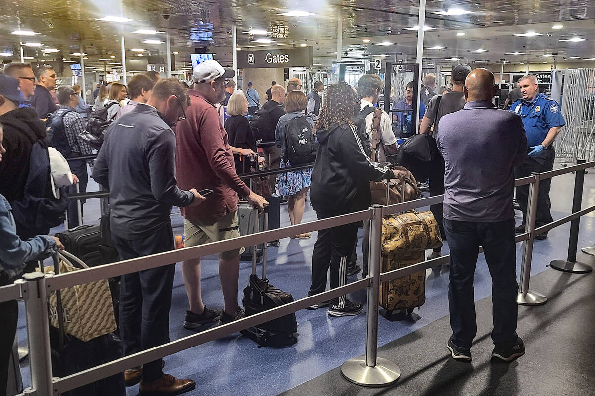 The security line for A and B Gates at Harry Reid International Airport is seen Wednesday, Octo ...