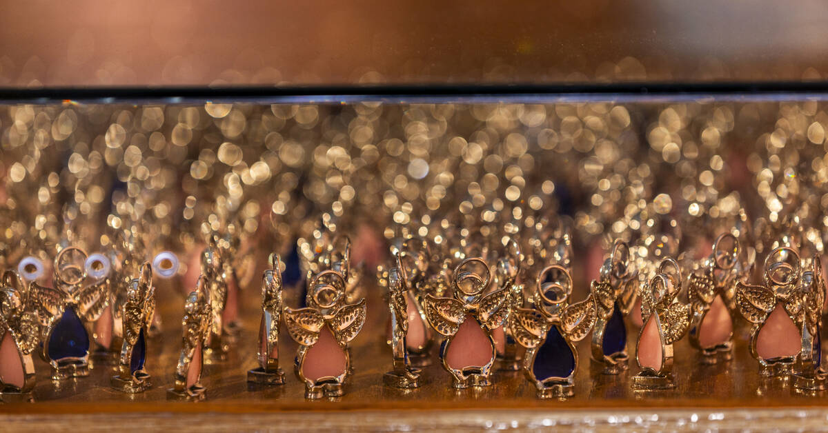 A large display of handmade angels is shown at the "Remembering October 1" exhibit fo ...