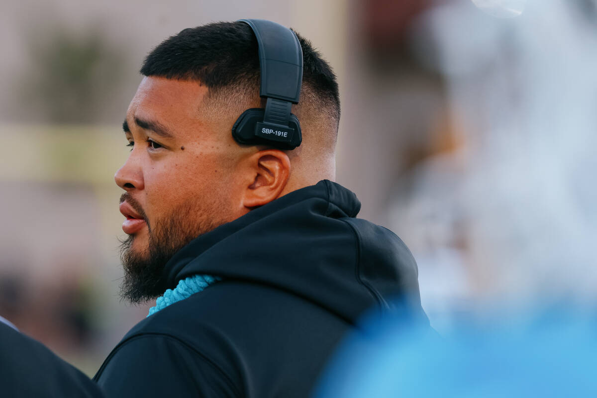 Sloan Canyon head coach Nate Oishi stands on the sidelines of a game on Friday, Sept. 26, 2025 ...