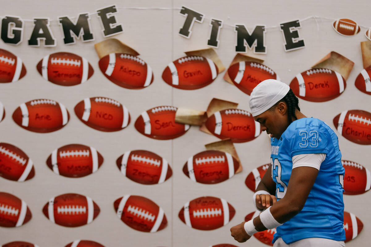 Caiden Jackson adjusts tape on his wrists before the game on Friday, Sept. 26, 2025 in Las Vega ...