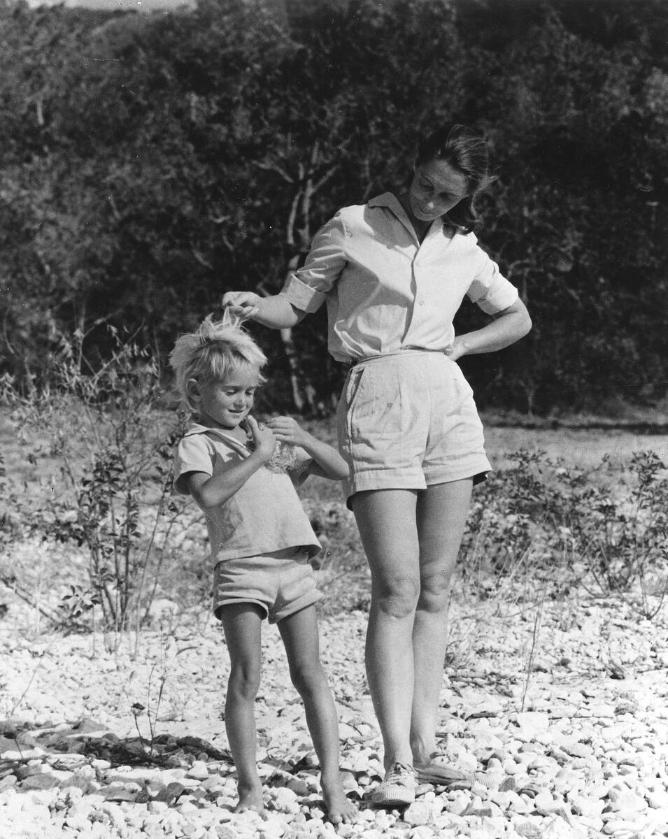 Jane Goodall and her son Hugo, known as Grub, born in 1967, are seen on the shores of lake Tang ...