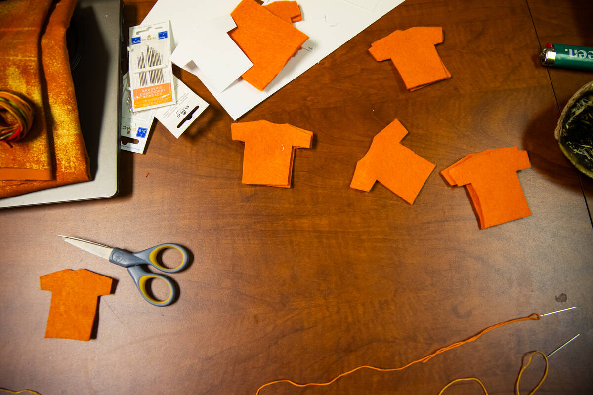 Small orange shirts symbolize missing and lost Native American children during a gathering for ...