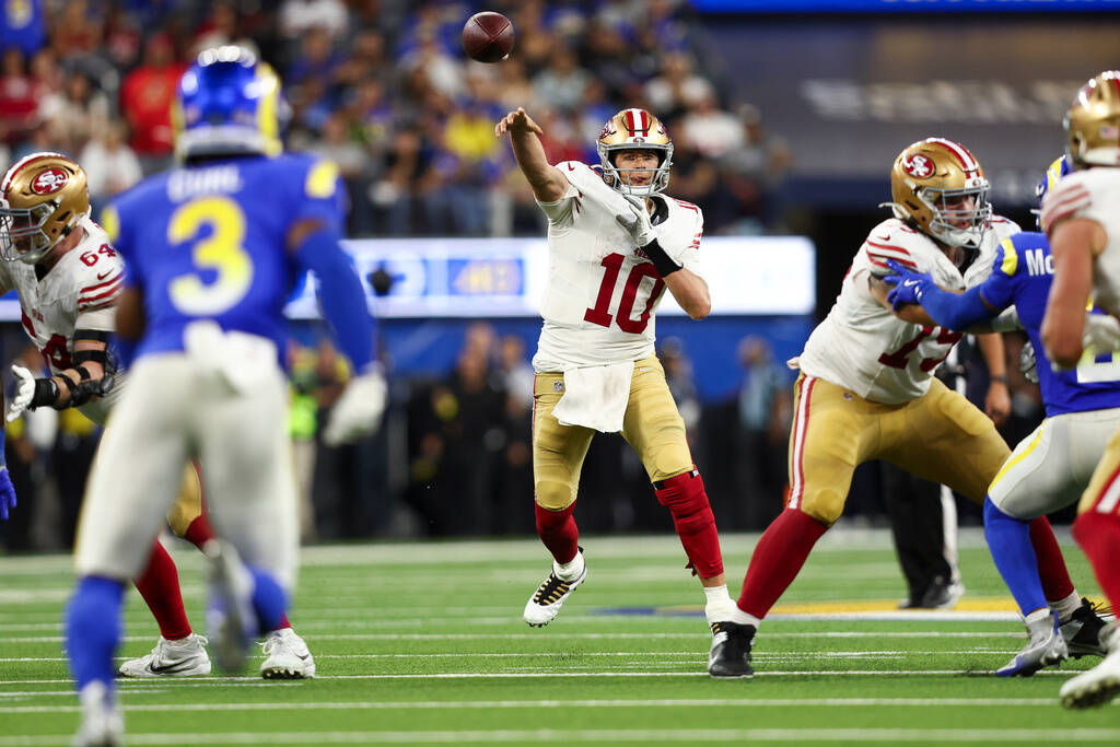 San Francisco 49ers quarterback Mac Jones (10) throws the ball during the second half of an NFL ...