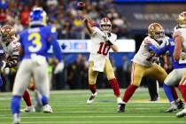 San Francisco 49ers quarterback Mac Jones (10) throws the ball during the second half of an NFL ...