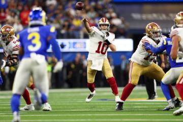 San Francisco 49ers quarterback Mac Jones (10) throws the ball during the second half of an NFL ...