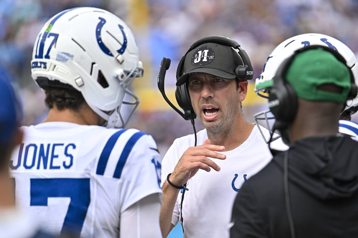 Indianapolis Colts head coach Shane Steichen talks with quarterback Daniel Jones (17) during th ...