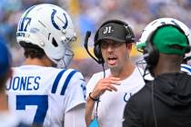 Indianapolis Colts head coach Shane Steichen talks with quarterback Daniel Jones (17) during th ...