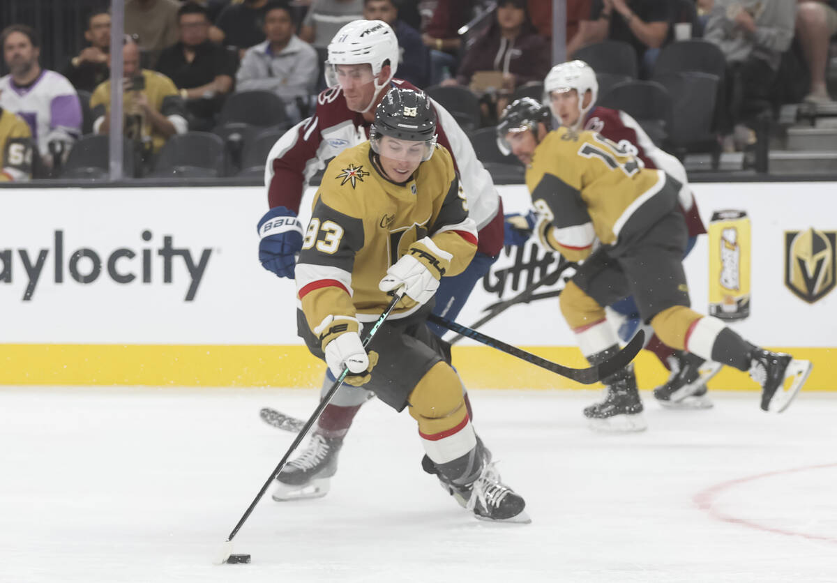 Golden Knights right wing Mitch Marner (93) skates with the puck during the first period of an ...