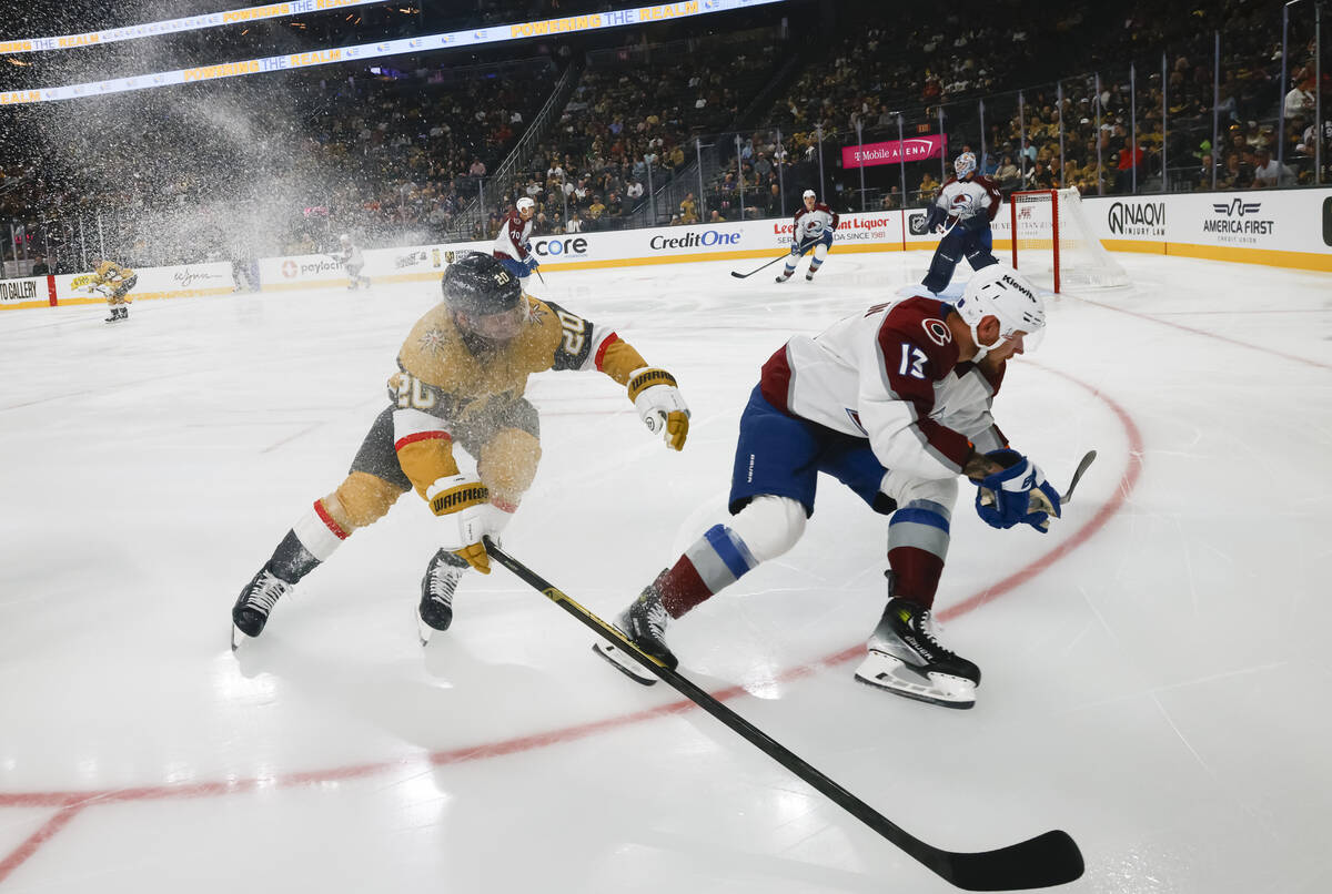 Golden Knights left wing Brandon Saad (20) and Colorado Avalanche right wing Valeri Nichushkin ...