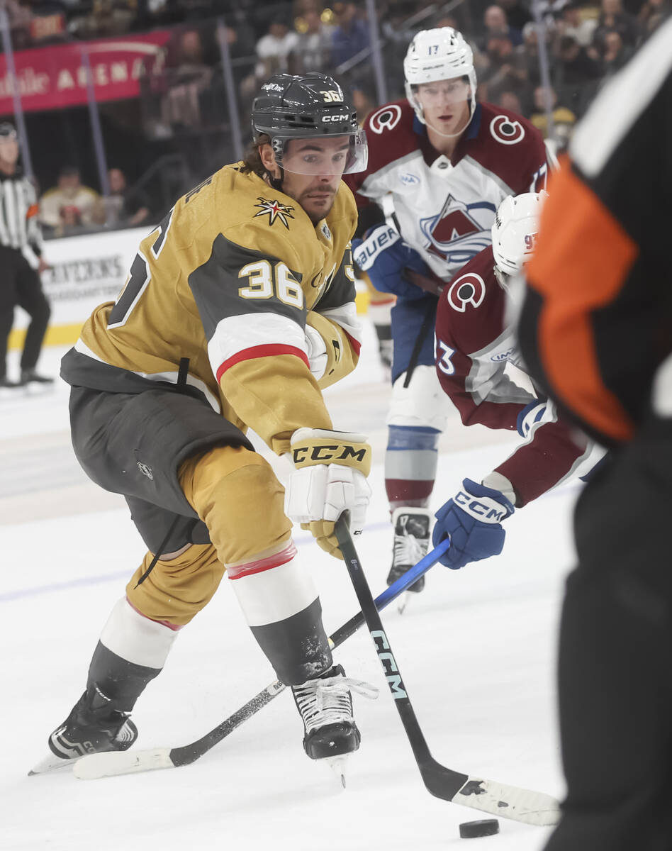 Golden Knights center Raphael Lavoie (36) skates with the puck under pressure from Colorado Ava ...