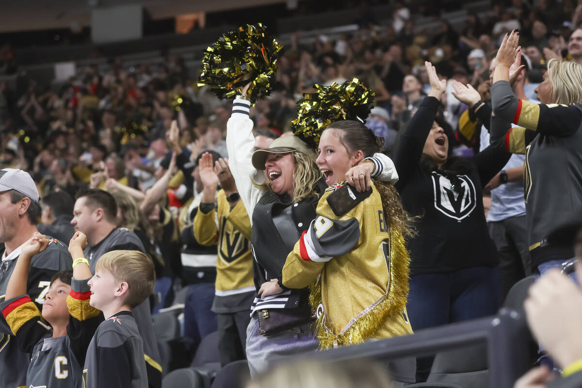 Golden Knights fans celebrate a goal against the Colorado Avalanche during the third period of ...