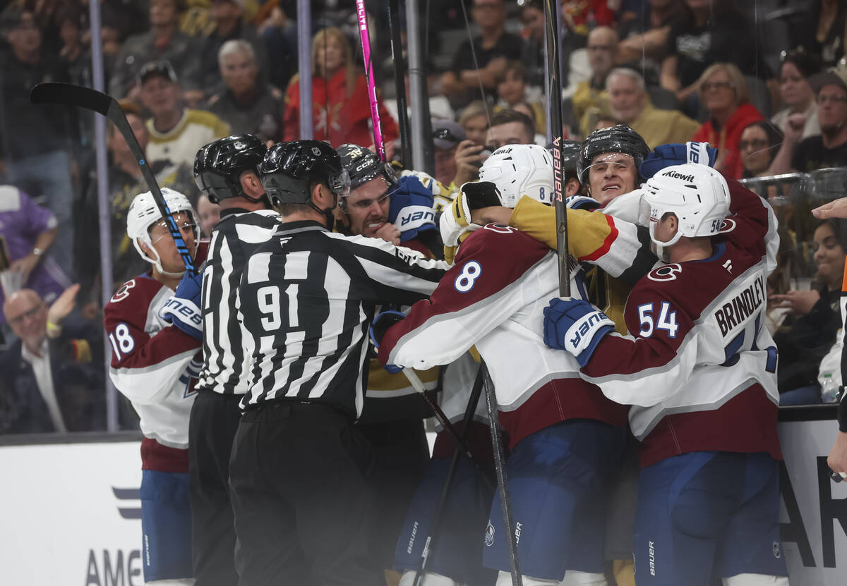Golden Knights players get into a fight with the Colorado Avalanche during the third period of ...