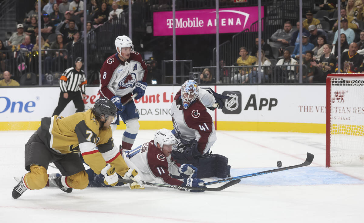 Golden Knights center William Karlsson (71) knocks the puck into the net past Colorado Avalanch ...